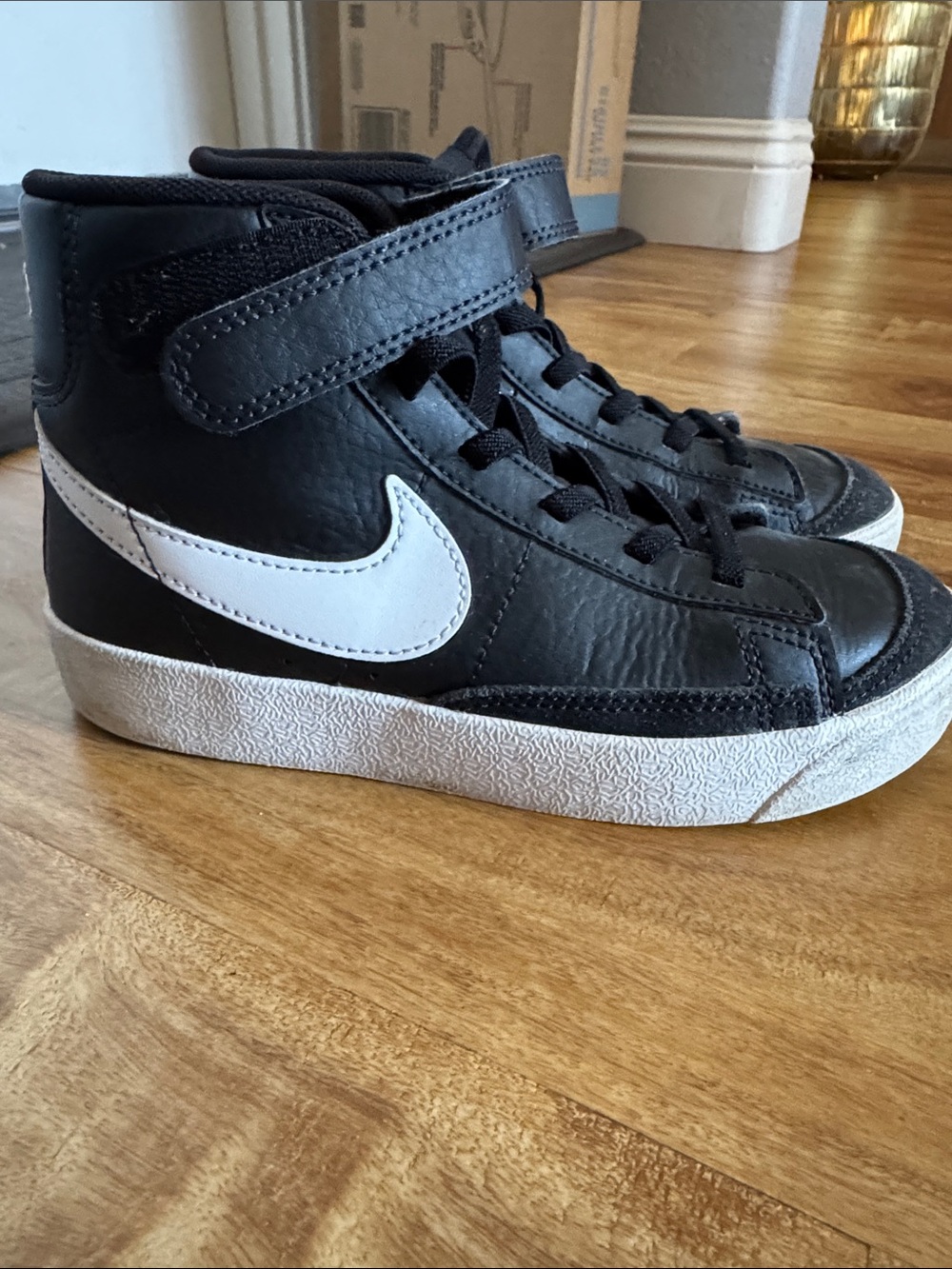 Nike Kids Black High-Top Sneakers with White Swoosh